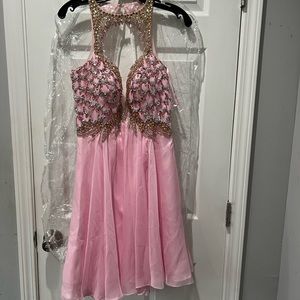 Never worn! Pink chiffon short flory dress with beaded bodice & open back. Sz 8